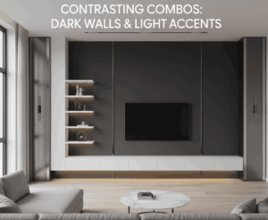 A contemporary living room featuring a "Contrasting Combo: Dark Walls & Light Accents." A large charcoal grey media wall is complemented by white open shelving on the left and white floating cabinets below the TV. Brushed metal accents and warm LED lighting create depth. The room is spacious with light wooden flooring and a large grey sectional sofa.