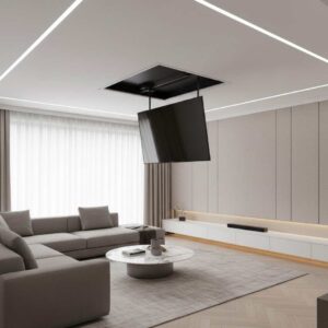 A living room with a clean ceiling, showing a TV screen lowering via a drop-down mechanism.